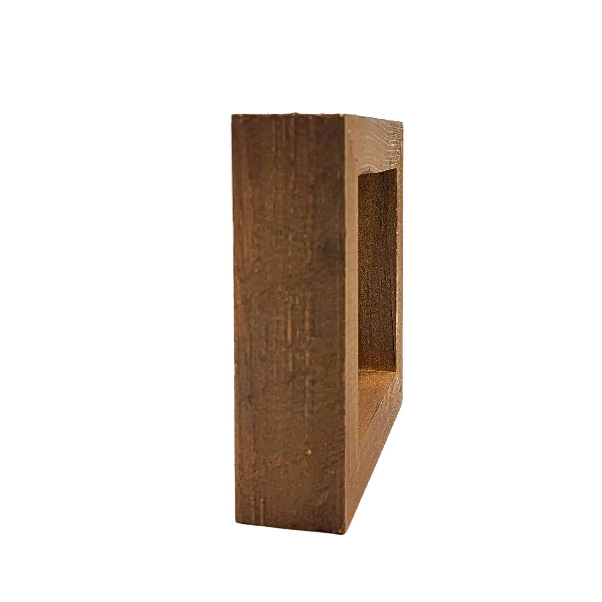 Decorative sign with text 'It takes hands to build a house but only hearts can build a home' on a white background.