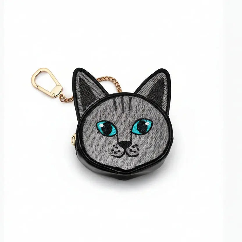 Cat-shaped keychain on a white background