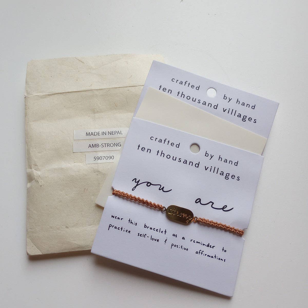 Pulsera de afirmación Diez Mil Aldeas - Eres Fuerte