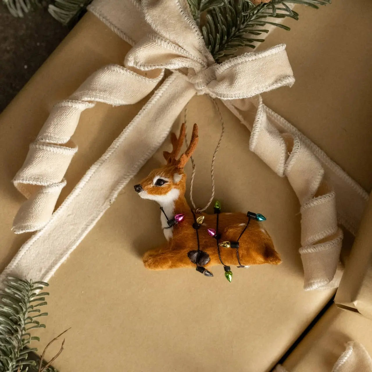 Resting Festive Fur Deer Ornament - 3.5