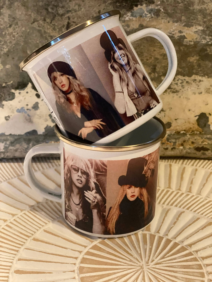 Two mugs with a design of a woman wearing a hat on a textured surface.