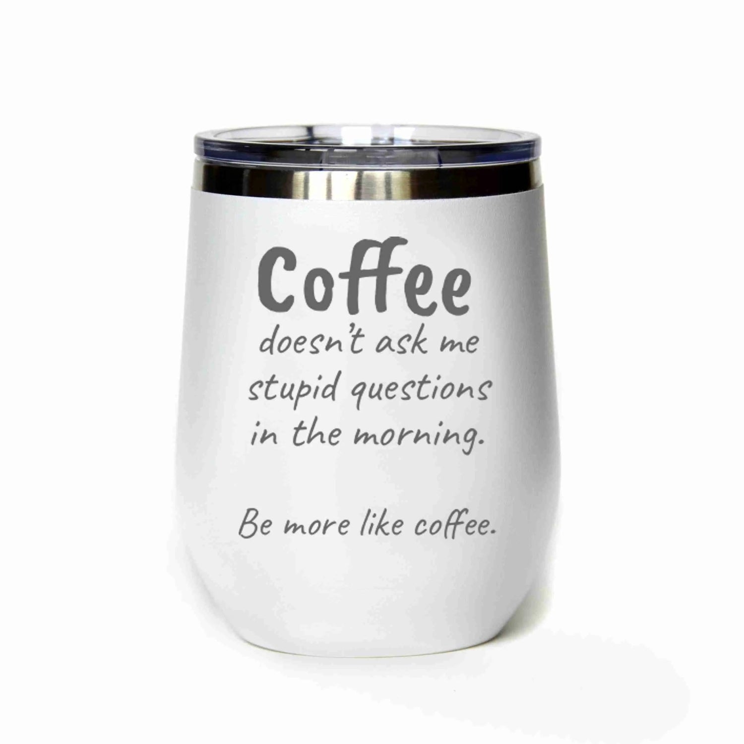 White insulated tumbler with humorous coffee quote on a white background