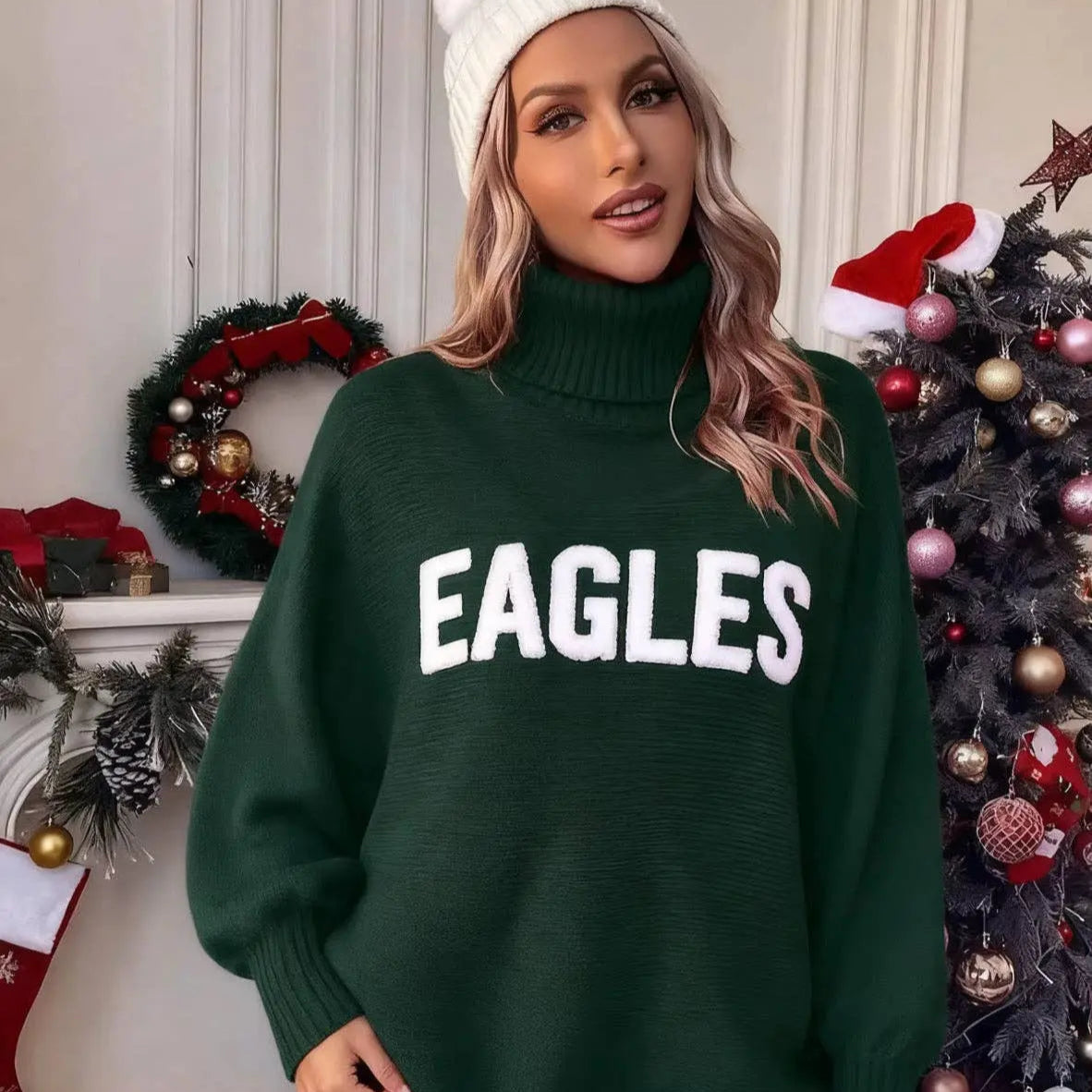 Person wearing a green sweater with 'EAGLES' text in a festive indoor setting.