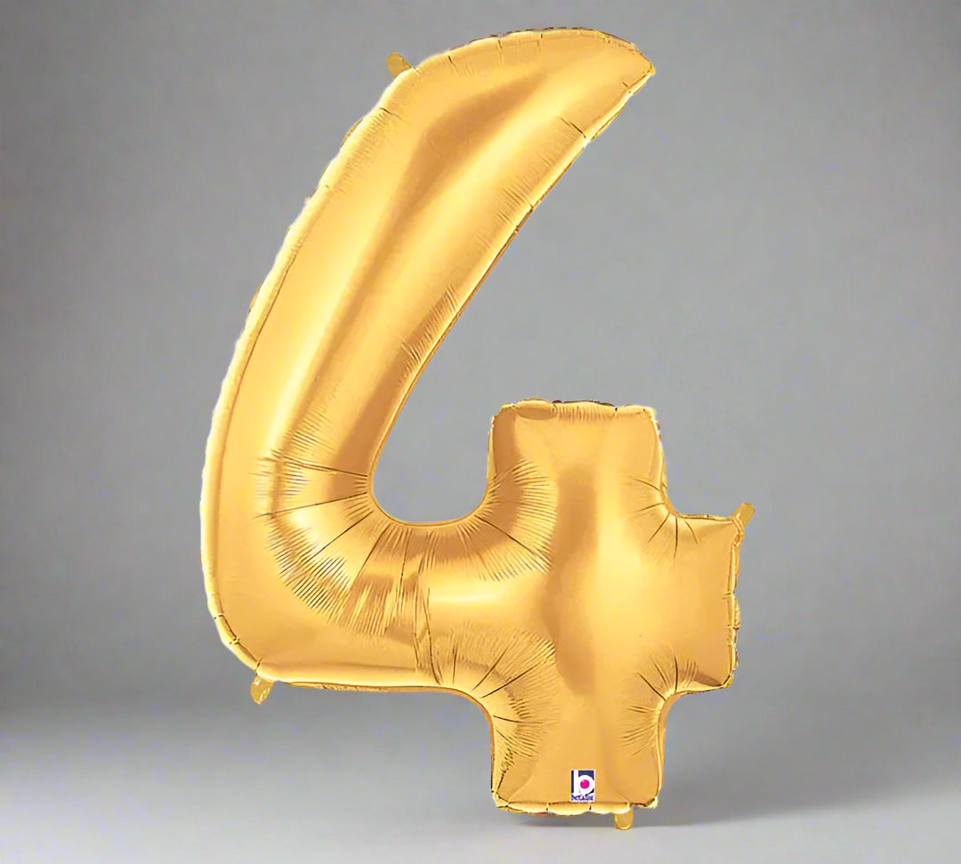 Gold number 4 balloon on a white background