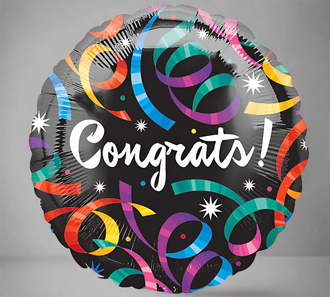 Decorative balloon with colorful patterns and 'Congrats!' text on a white background