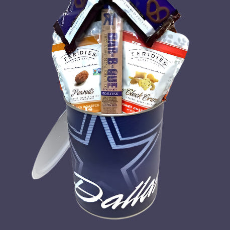 Snack bucket with various snacks including Panuts Goldfish, and pretzels on a dark background