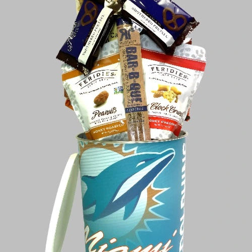 Snack basket with various treats in a container featuring a dolphin design on a gray background