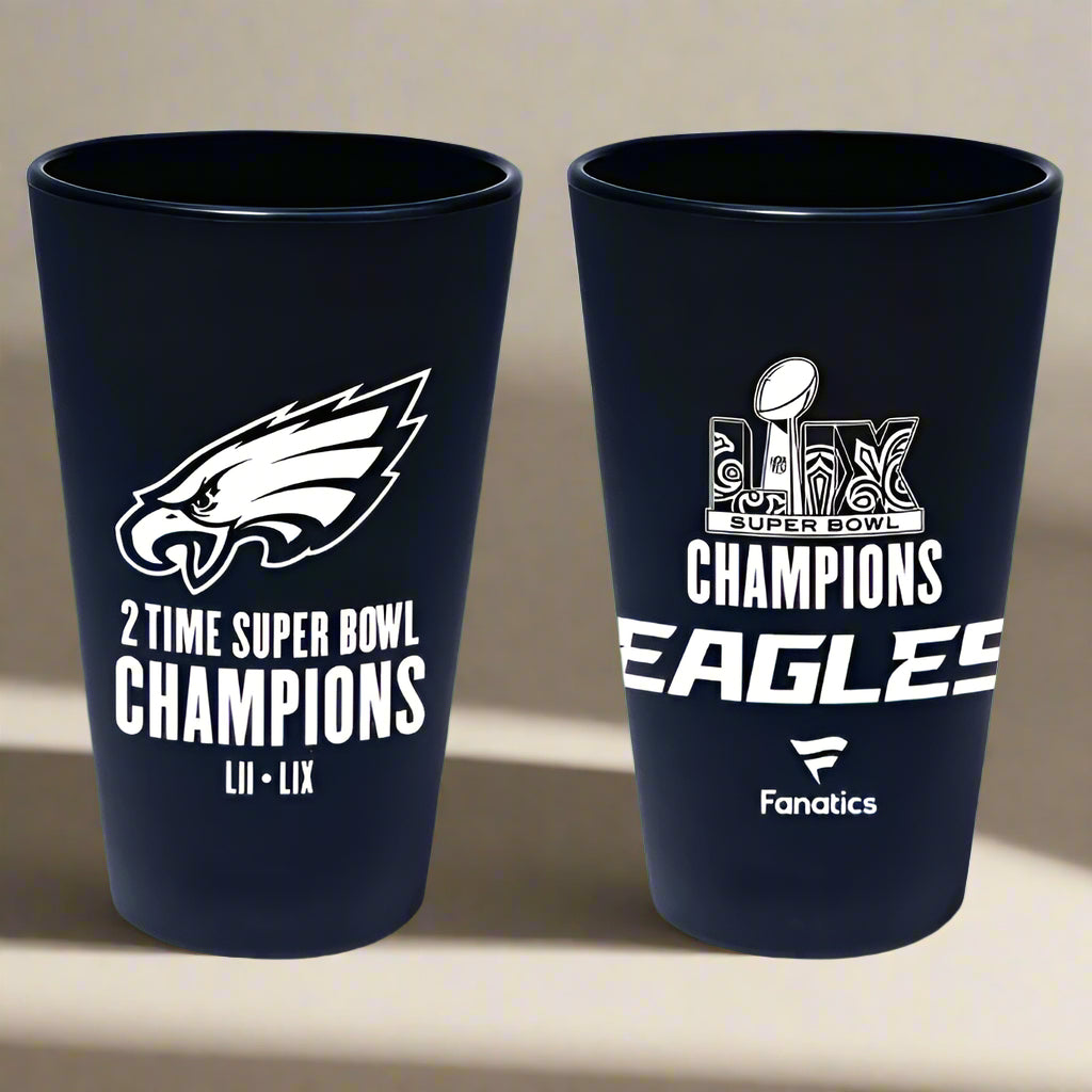 Two black tumblers with Philadelphia Eagles branding and Super Bowl LIIX Champions text on a beige background.