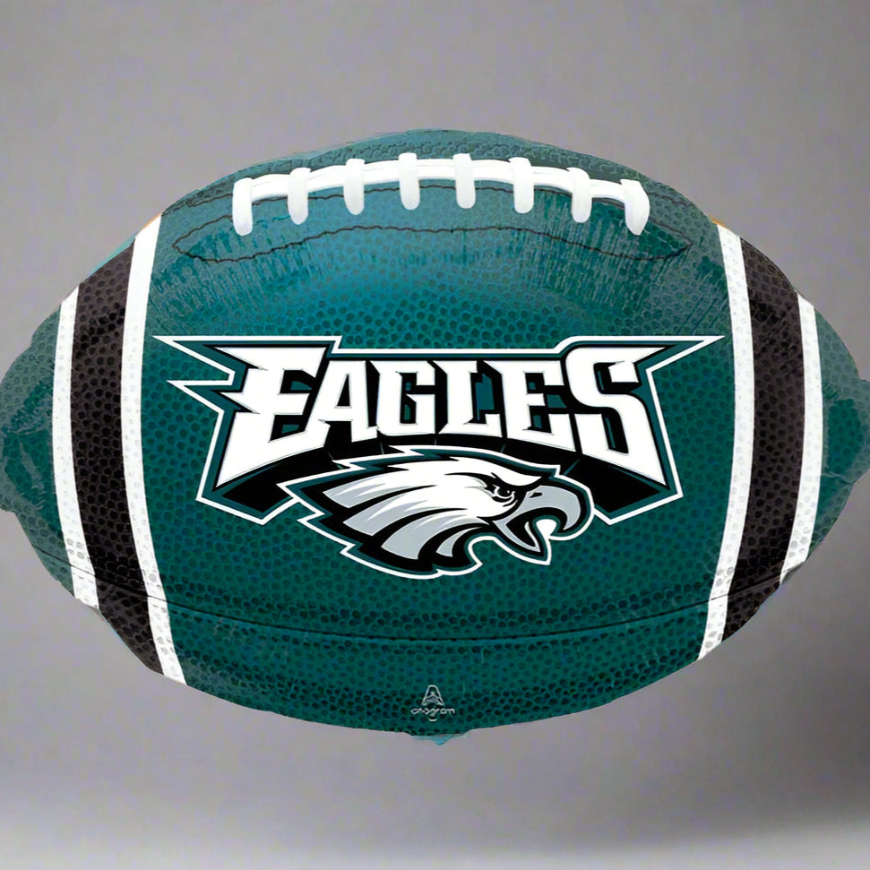 Football-shaped balloon with Philadelphia Eagles logo on a white background