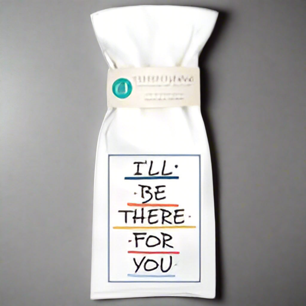 White towel with 'I'll be there for you' text on a gray background