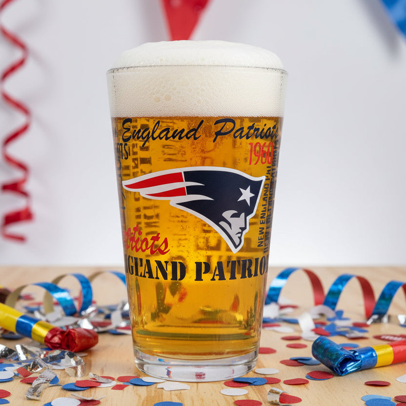 Glass tumbler with New England Patriots logo and text on a white background