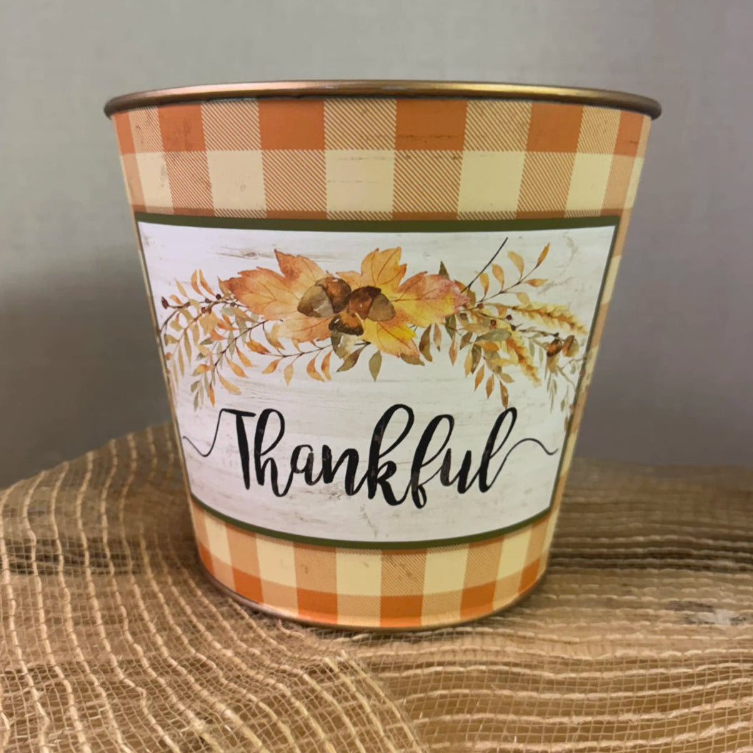 Gift basket with Milano chocolate and other snacks on a neutral background