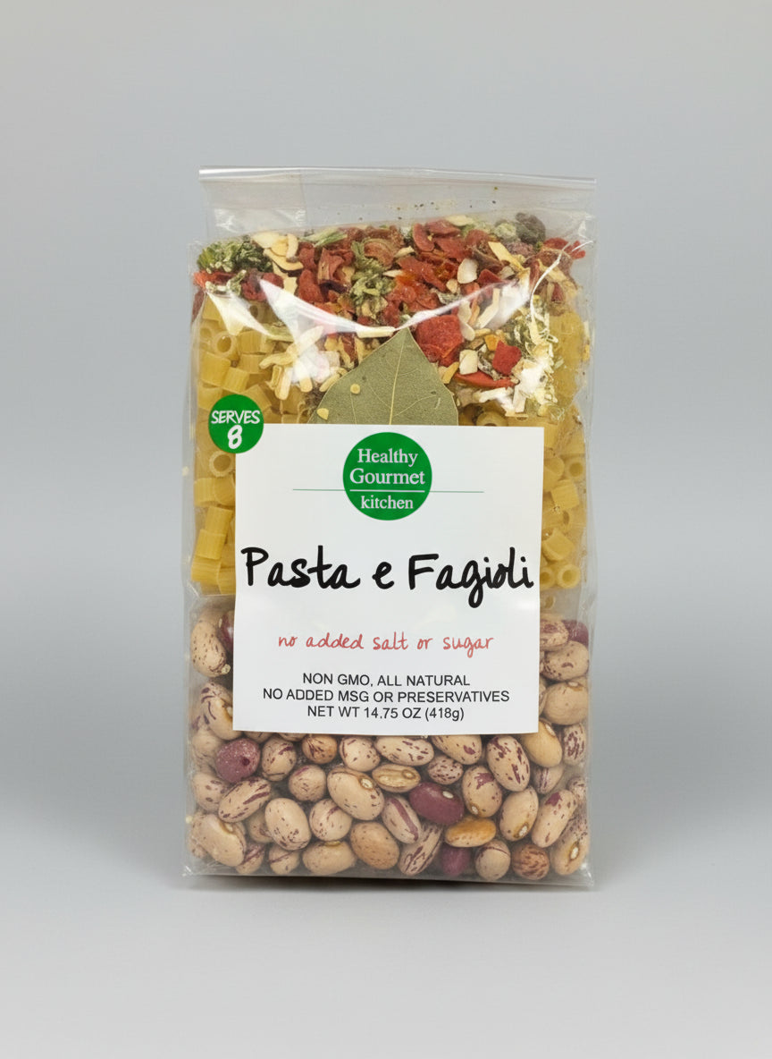 Package of 'Pasta e Fagioli' from Healthy Gourmet Kitchens on a metallic surface.