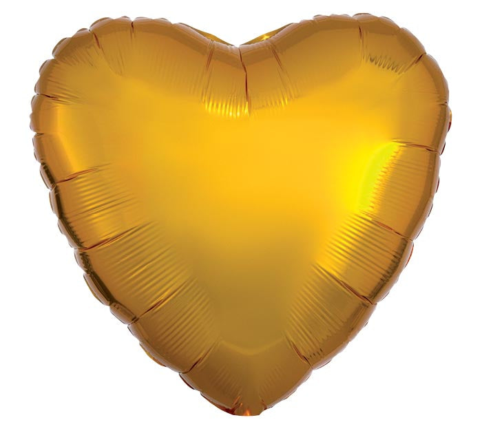 Gold heart-shaped balloon on a white background