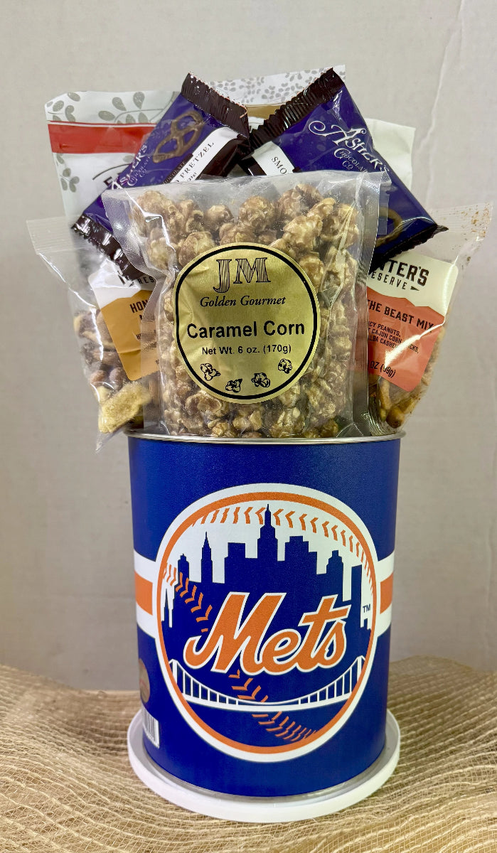 Gourmet snack basket with caramel corn and other treats in a Mets-themed container.