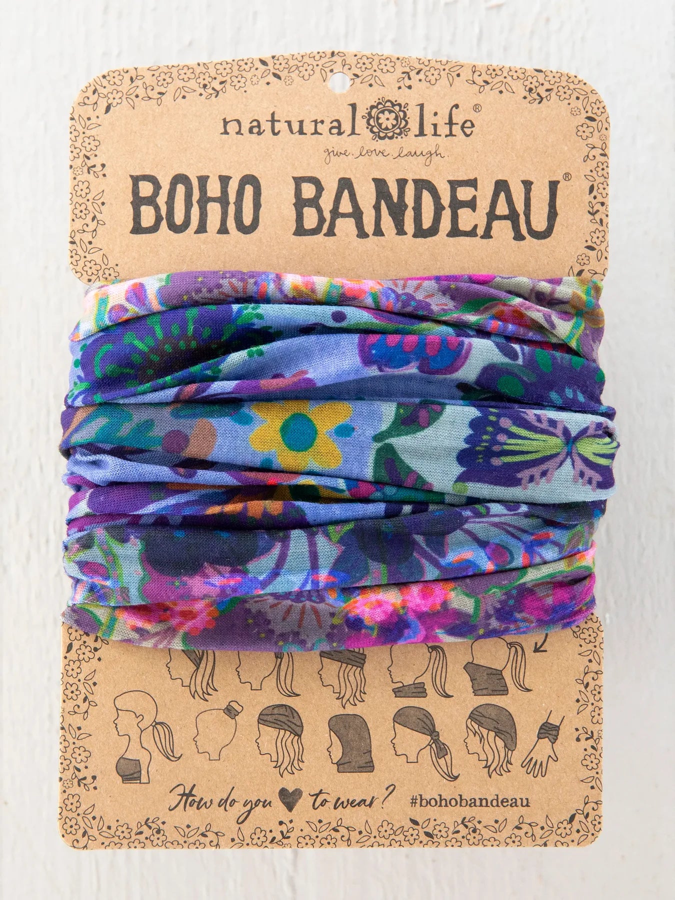 Colorful boho bandeau on a Natural Life branded packaging
