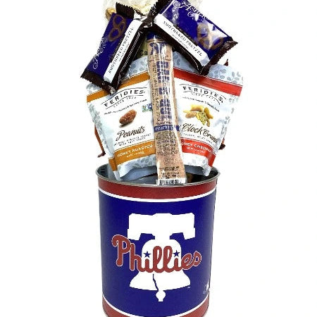 Gift basket with snacks in a Phillies-themed bucket on a white background