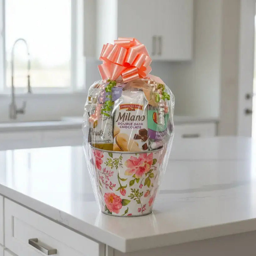 Decorative vase with floral pattern and Milano chocolate packaging on a kitchen counter