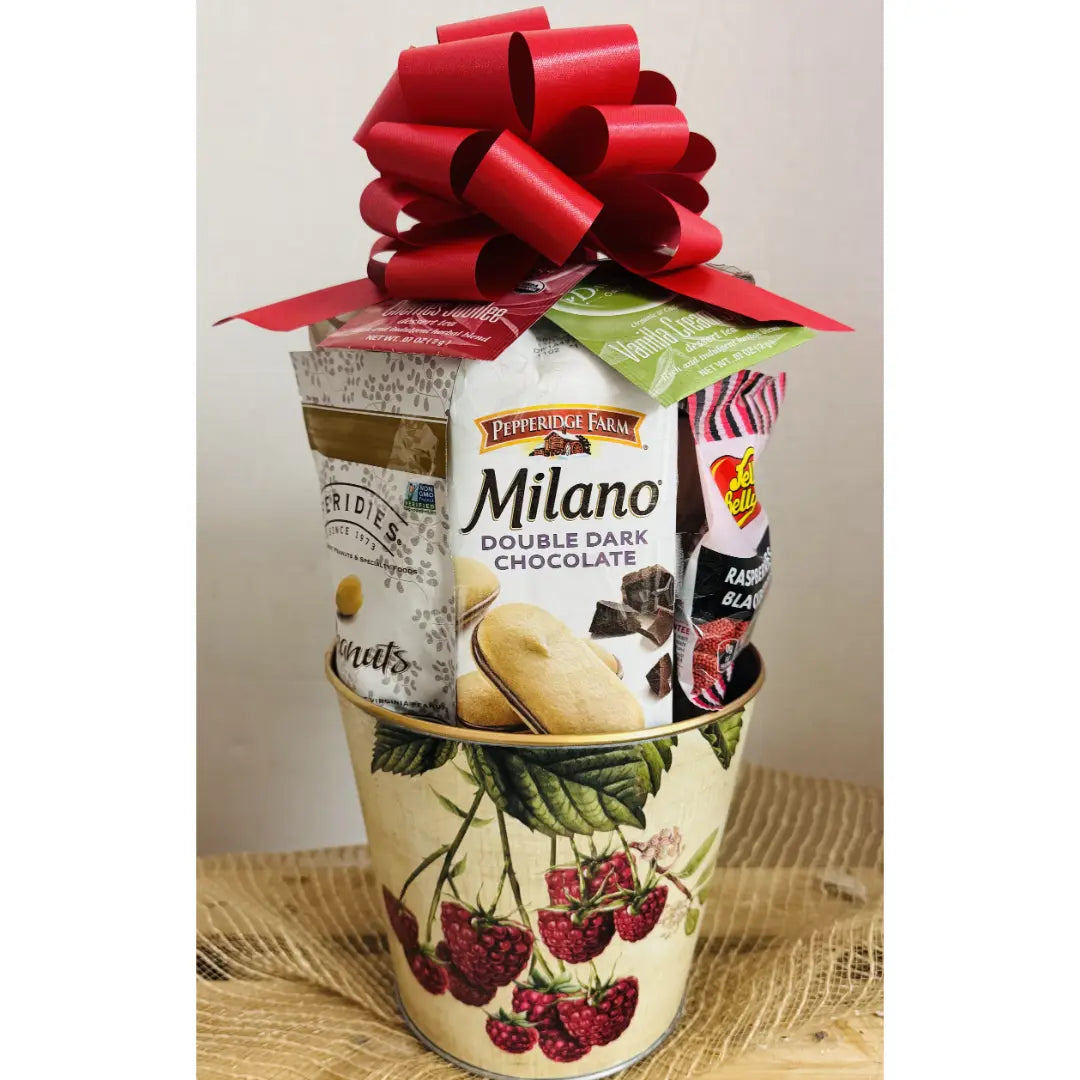 Gift basket with Milano chocolate and other items on a decorative stand.