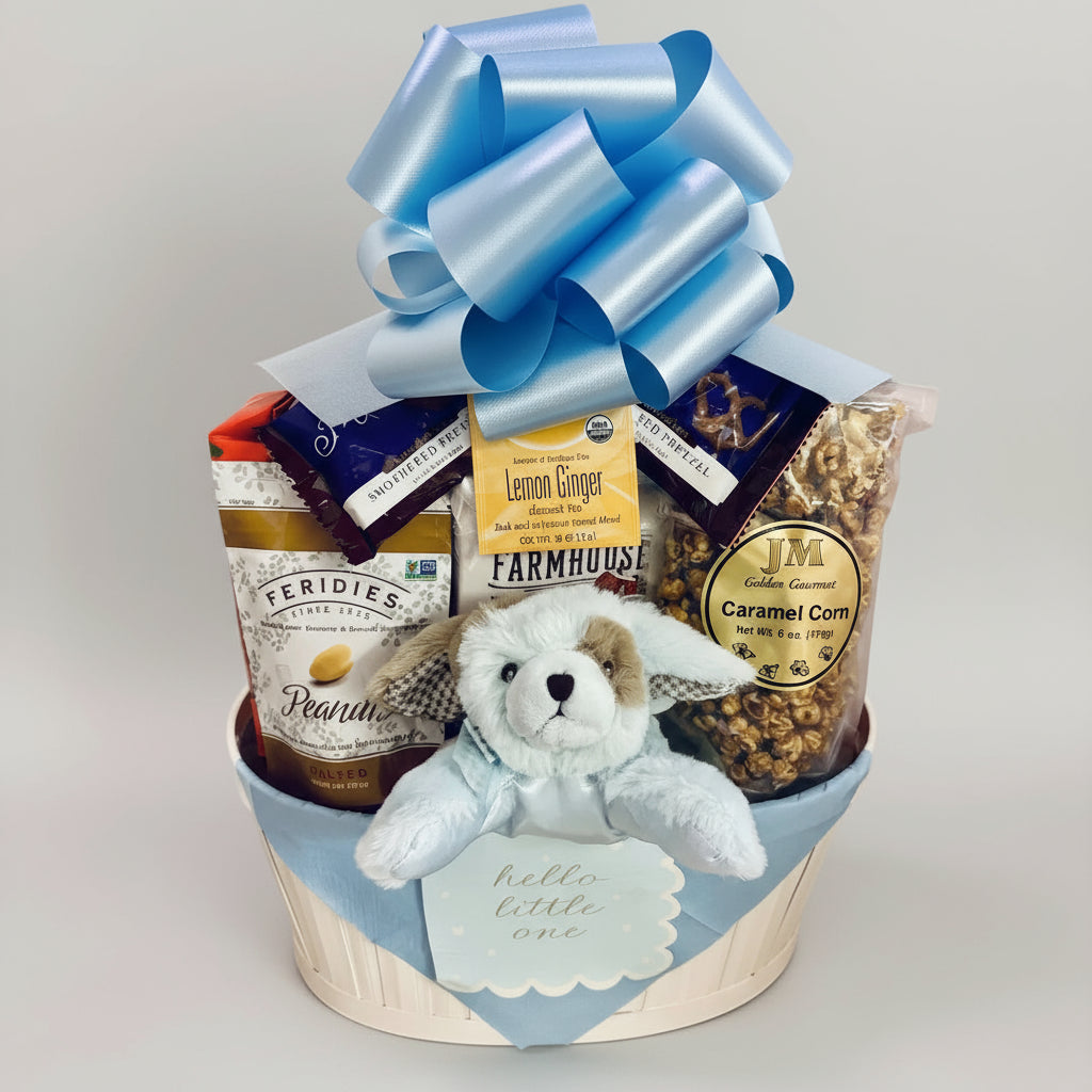 Gift basket with snacks, a teddy bear, and a blue bow on a white background