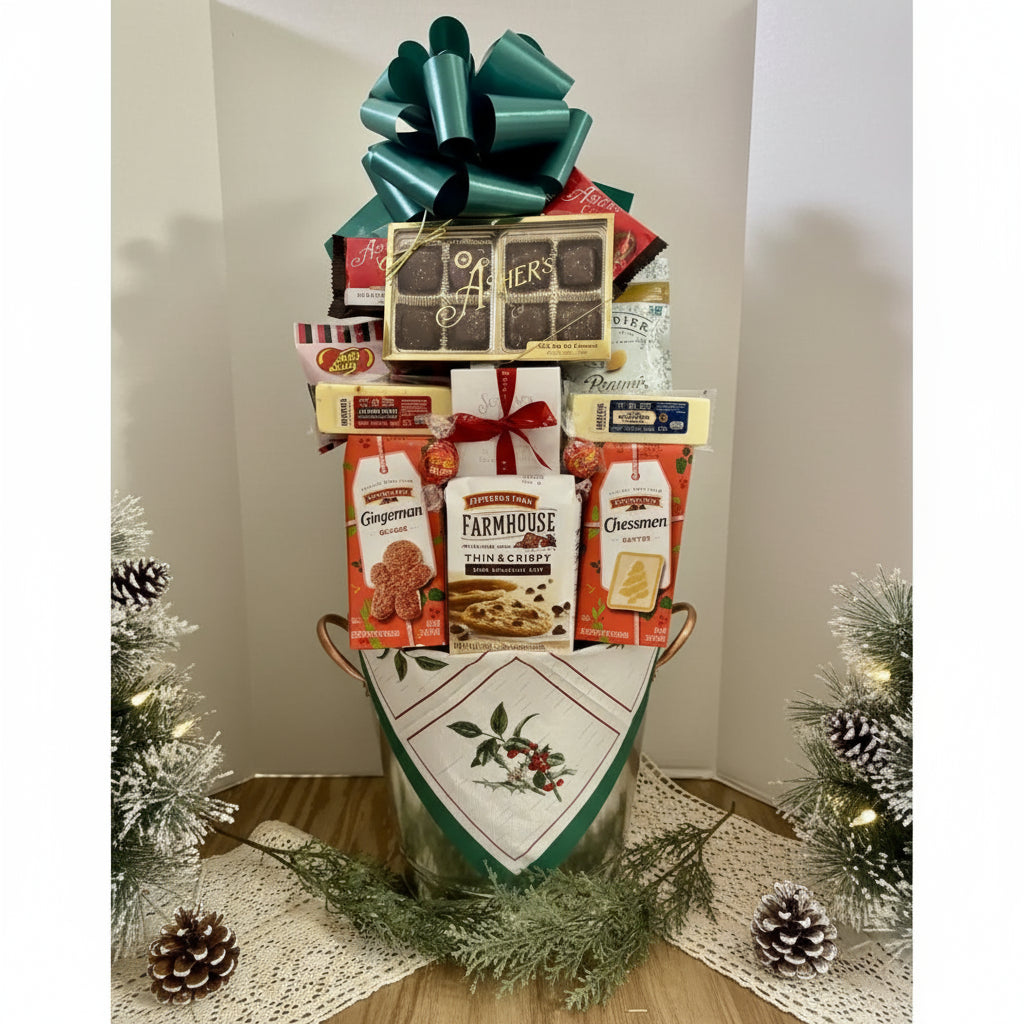 Gift basket with various items including chocolate, cookies, and a bow on a white background