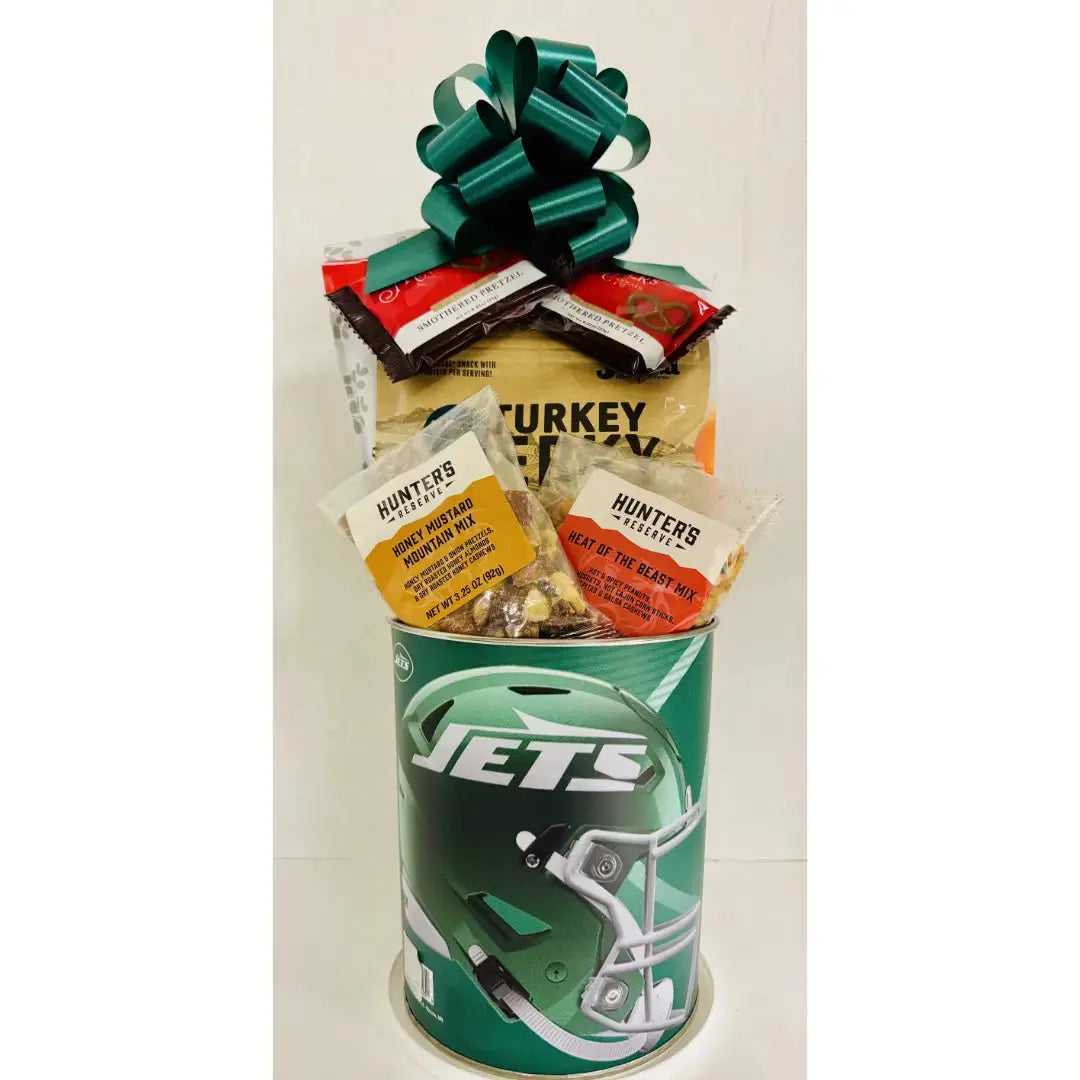 Gift basket with a 'Jets' branded canister, snacks, and a decorative bow on a white background.