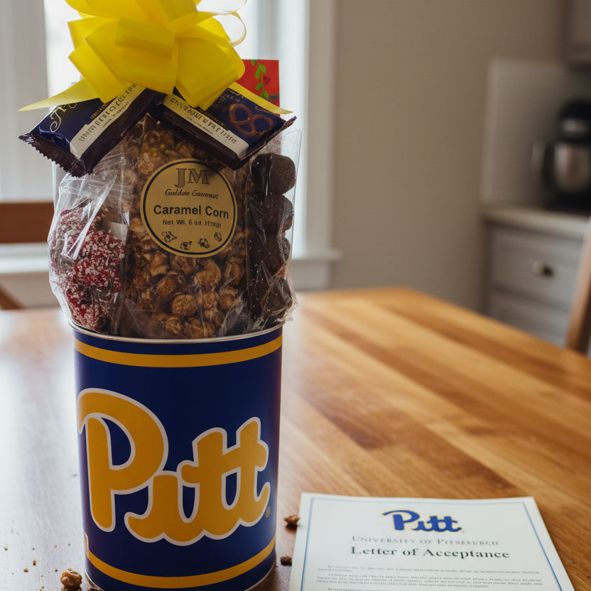 Gift basket with a yellow bow and 'Pitt' branding on a white background